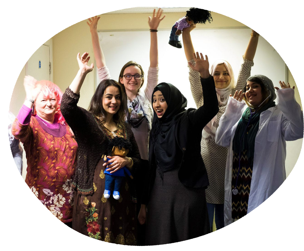 Photo of a group of women together cheering. Photos by Faith Action: https://www.faithaction.net.